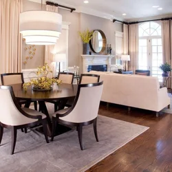 Living room with round sofa interior photo
