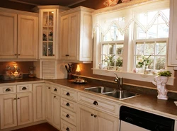 Kitchen corner photo with sink by the window