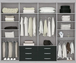 Filling the wardrobe in the bedroom design photo