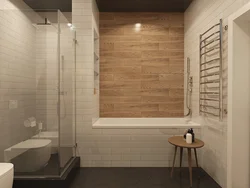 Combination of tiles and wood in the bathroom interior