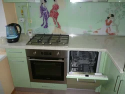 Corner kitchen with dishwasher photo