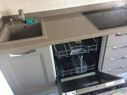 Corner kitchen with dishwasher photo