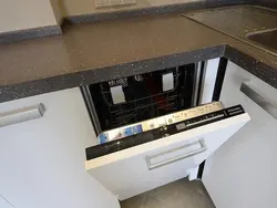 Corner kitchen with dishwasher photo