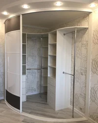 Photo of corner wardrobes in the bedroom interior