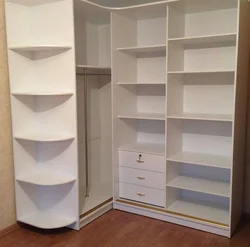 Photo of corner wardrobes in the bedroom interior