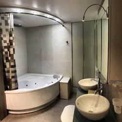 Bath design with corner bathtub and shower