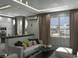 Interiors of a living room with a kitchen by the window