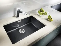 Photo of kitchen sinks made of artificial stone in the interior photo