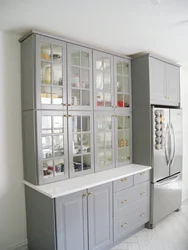 Kitchen cabinets with glass photo