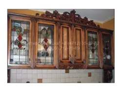 Photo of a kitchen with colored glass