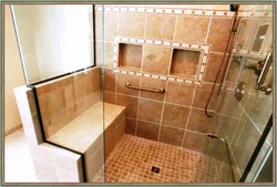 Shower tray made of tiles in the bathroom photo