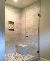 Shower tray made of tiles in the bathroom photo