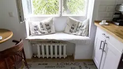 Wide window sill in the kitchen photo