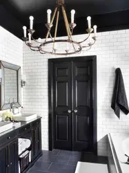 Bathroom design with dark door