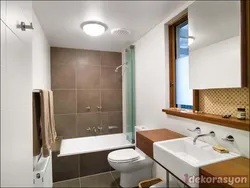 Bathtub with narrow window design