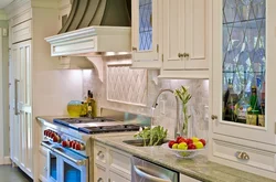 Sink and stove in the kitchen photo