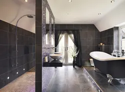 Black bathtub in the bathroom interior photo