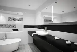 Black bathtub in the bathroom interior photo