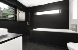 Black Bathtub In The Bathroom Interior Photo