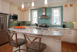 Kitchen interior with three windows