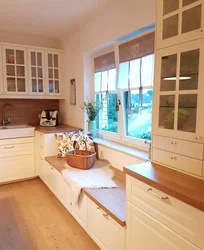Kitchen interior in a house with window and door