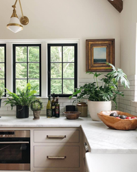 Kitchen interior in a house with window and door