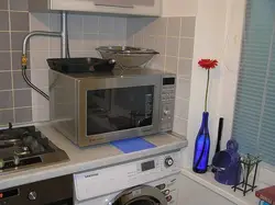 Kitchen Design With Gas Pipe Behind The Refrigerator