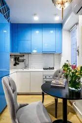 Interior of a small blue kitchen