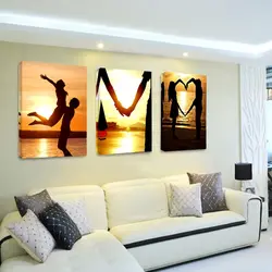 Modern paintings in the living room above the sofa photo