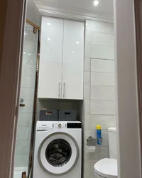 Cabinet Above The Washing Machine In The Bathroom Photo In The Interior