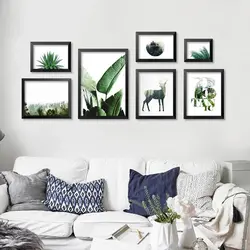 Posters for the interior on the wall in the living room