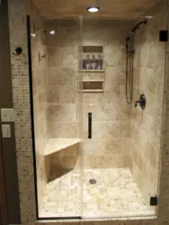 Photo of a bathtub with a shower screen without a tray