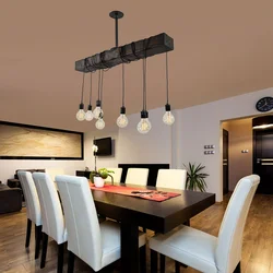 Lamps above the table in the kitchen photo