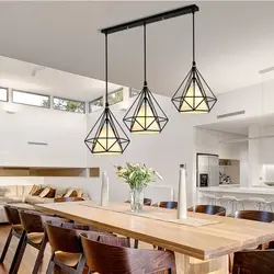 Lamps above the table in the kitchen photo