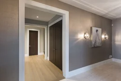 Entrance to the living room without a door in a modern interior