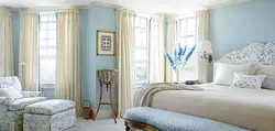 Bedroom in beige and blue tones photo