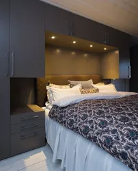 Built-in wardrobes in a bedroom with a bed photo design