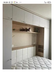 Built-In Wardrobes In A Bedroom With A Bed Photo Design
