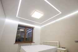 Ceilings with light lines photo in the bedroom