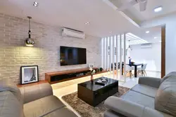 Kərpic bitişli qonaq otağının interyeri