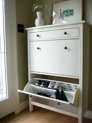 White shoe racks in the hallway photo