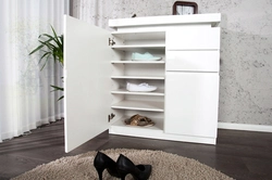 White shoe racks in the hallway photo