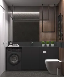 Black washing machine in the bathroom interior photo