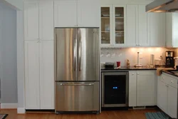 Refrigerator at the entrance to the kitchen photo