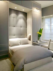 Interior design of a small bedroom with wardrobe