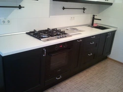 Kitchens with black gas stove photo