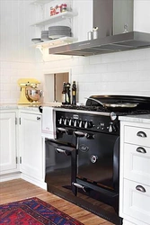 Kitchens with black gas stove photo