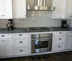 Kitchens with black gas stove photo