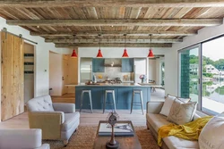 Interior of a living room kitchen in a frame house