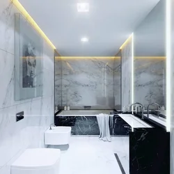 Bathroom design in black and white marble tiles